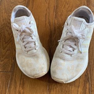 White and beige leopard print Adidas shoes